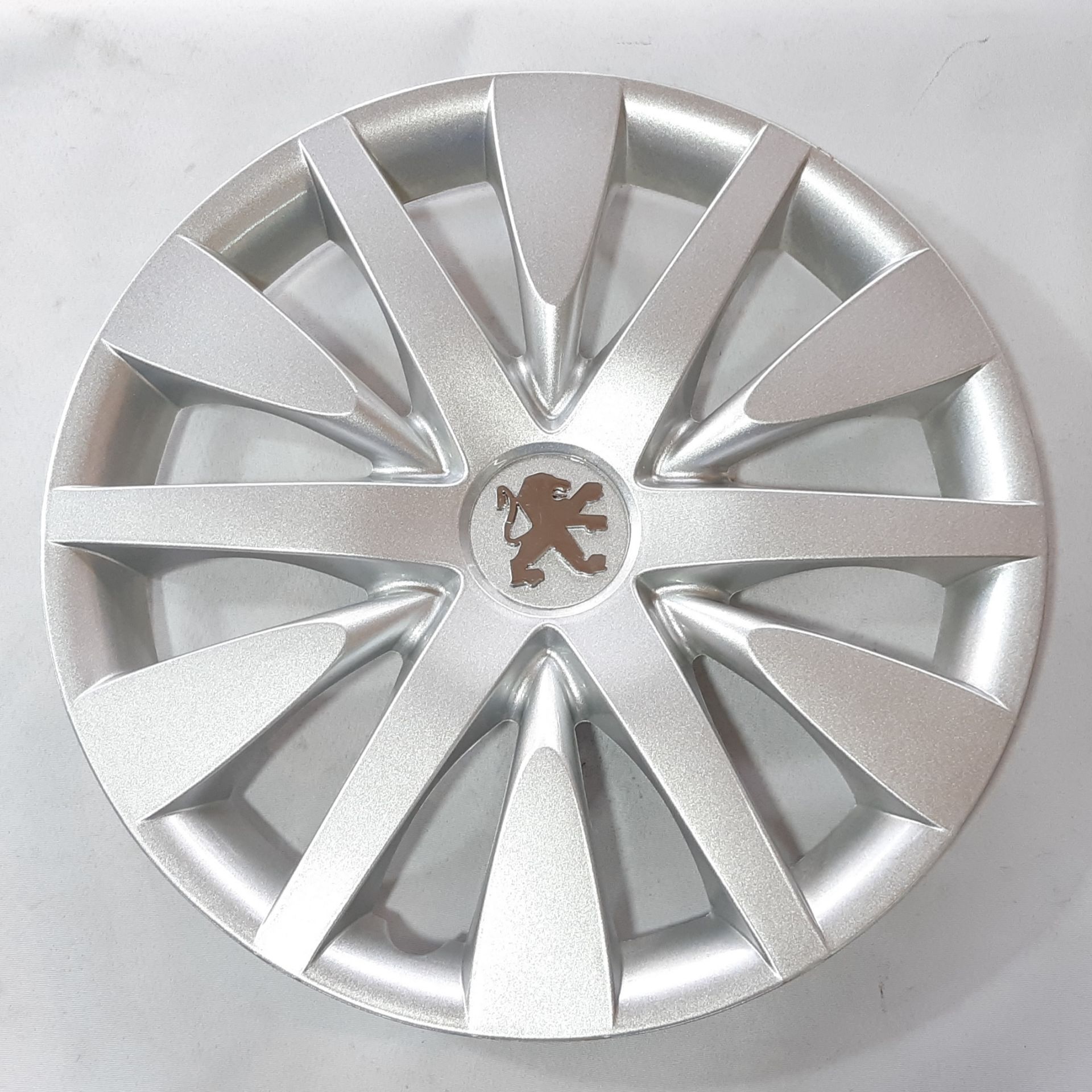 قالپاق رنو فلوئنس با آرم پژو برعکس سایز 15 برند ابویی 4 عددی